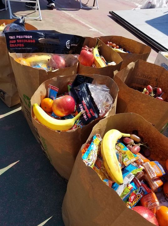 A few grocery bags of non-perishable and perishable food